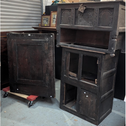 1068 - An 18th century carved oak occasional table with cupboard below; An 18th century straight front glaz... 