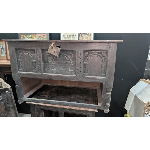 1068 - An 18th century carved oak occasional table with cupboard below; An 18th century straight front glaz... 