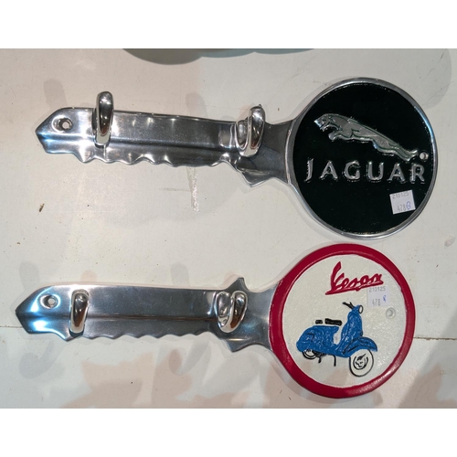 478B - Two automobile advertising wall mounting coat hooks, Vespa and Jaguar.