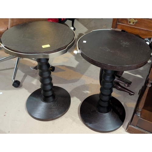 917 - A pair of unusual Italian design side table/wine table in dark wood with metal handles.