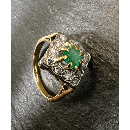 755 - An 18ct hallmarked gold diamond and emerald dress ring, the central emerald square cut and surrounde... 