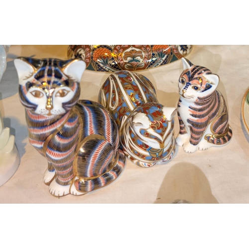 620 - Three Royal Crown Derby figures of cats.