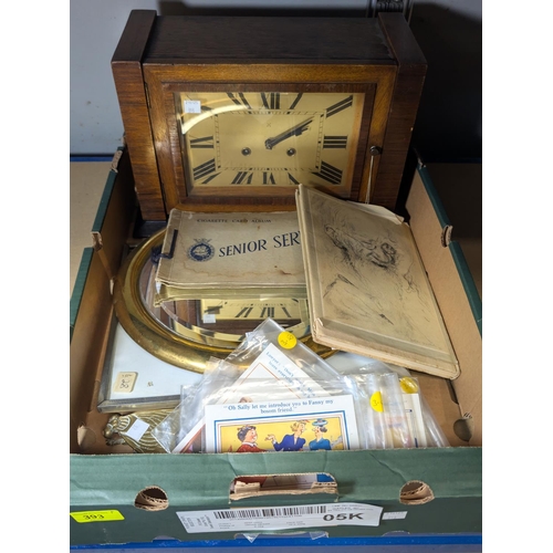 393 - A 1930's oak striking mantel clock; a mirror; humorous postcards; book on Topolski, etc.