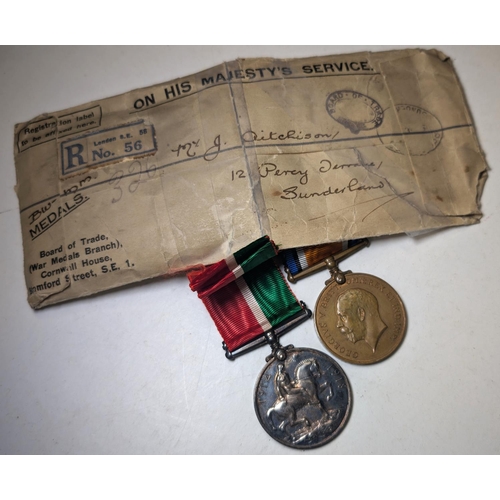 424 - WWI: a pair of medals to JOHN AITCHISON comprising war medal and mercantile marine medal.