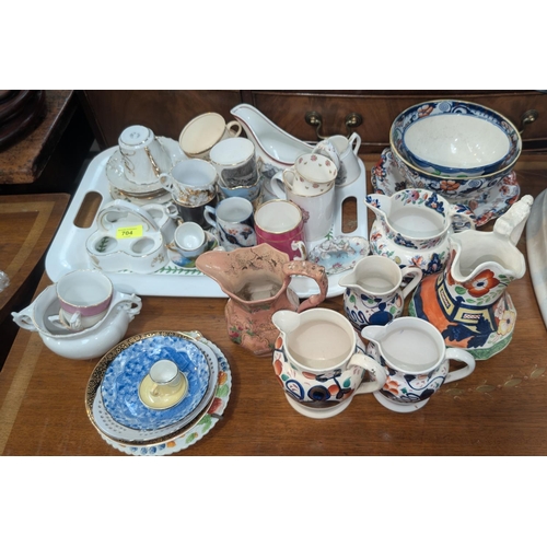 704 - A selection of Gaudy Welsh pottery jugs etc and other Welsh related pottery.