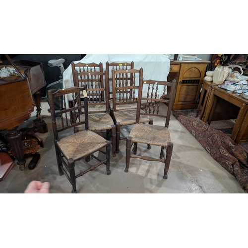 1013 - A set of 6 19th century country made elm Lancashire spindle back dining chairs with rush seats.