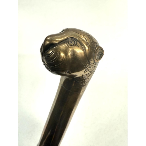 159 - A 19th Century Indian brass sword stick with simulated cane shaft and lion's head finial, 90cm.