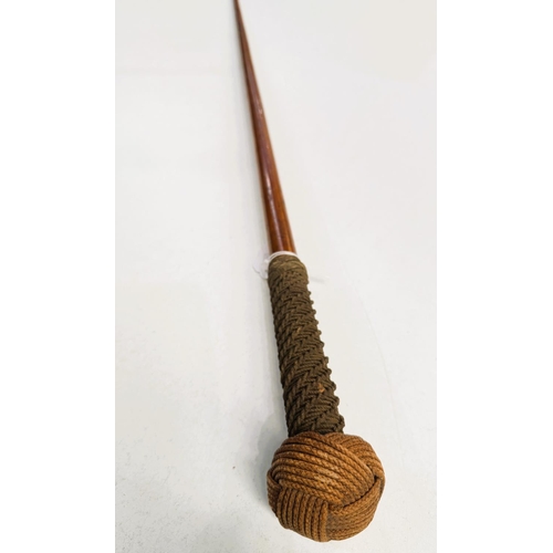 73 - A vintage hardwood stick with ropework band and knotwork finial, 90cm.