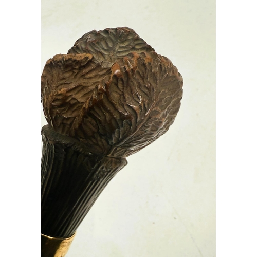 185 - A 19th Century Black Forest carved wood novelty stick finial with rabbit leaping from cabbage, with ... 