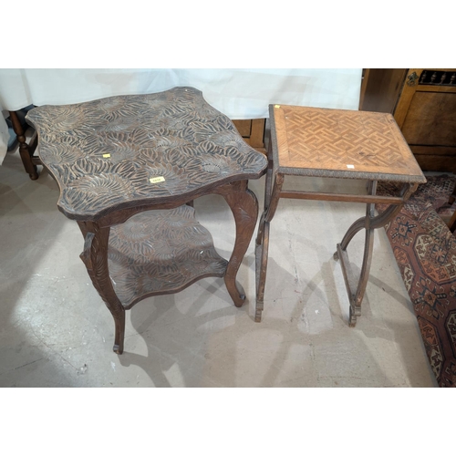 1016 - A Liberty style Japanese shaped square top 2 tier occasional table with extensive carved decoration;... 