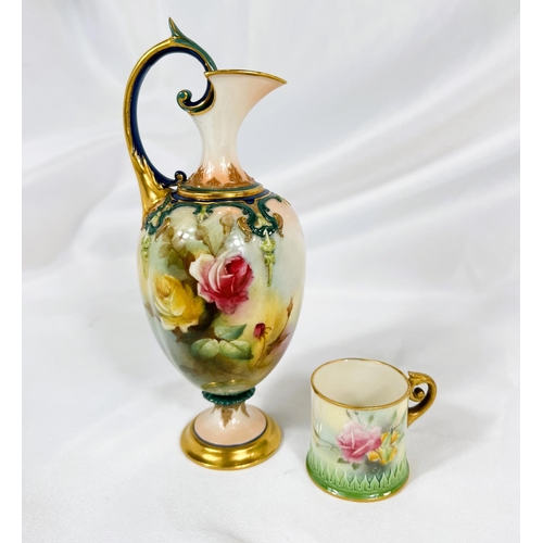 712 - A small Royal Worcester ewer shaped vase decorated with hand painted roses, ht. 18cm and a miniature... 