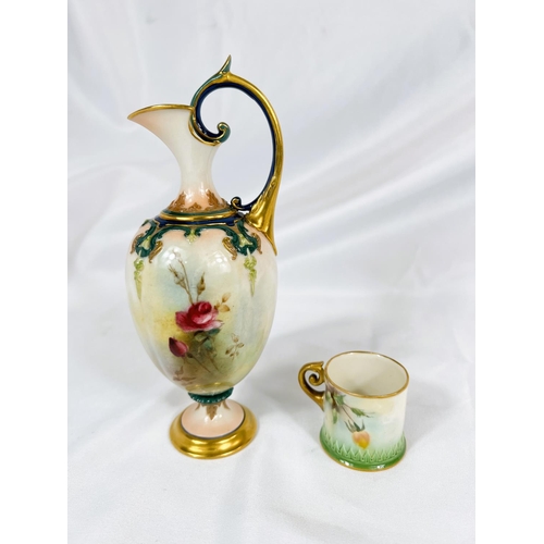 712 - A small Royal Worcester ewer shaped vase decorated with hand painted roses, ht. 18cm and a miniature... 