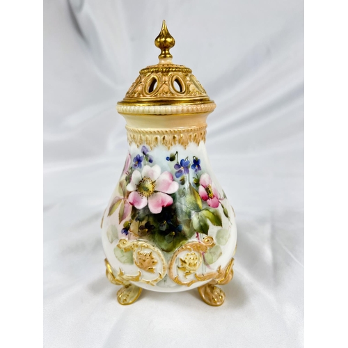 714A - A Royal Worcester covered baluster pot pourri vase on 3 raised paw feet, hand painted with flowers, ... 