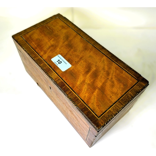 10 - A Georgian inlaid mahogany tea caddy with 3 internal compartments, length 25cm.