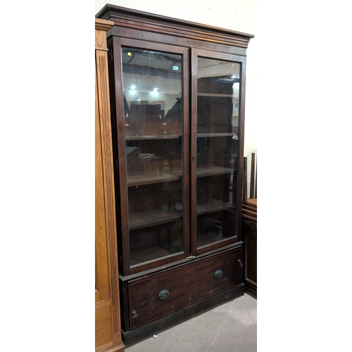 1017 - A late 19th/early 20th century mahogany full height display cabinet enclosed by 2 glazed doors with ... 