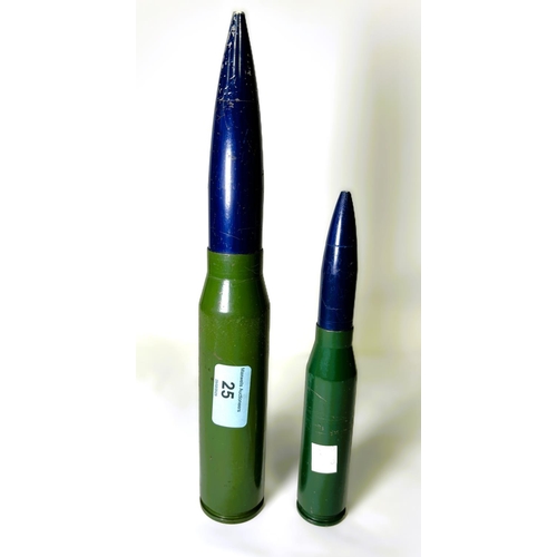 25 - A shell case drill rounds 28.5cm, another 20.5cm.