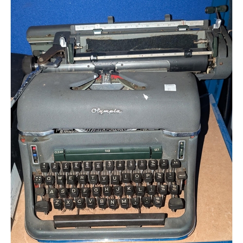 31 - A vintage Olympia typewriter, fountain pens etc.