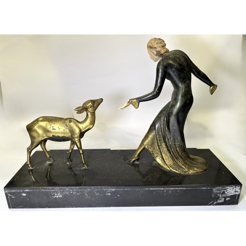 30B - An Art Deco statue with woman feeding deer.