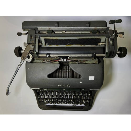 31 - A vintage Olympia typewriter, fountain pens etc.