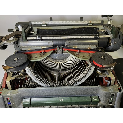 31 - A vintage Olympia typewriter, fountain pens etc.