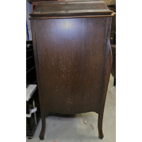 40 - An early 20th century HMV oak-cased gramophone cabinet.