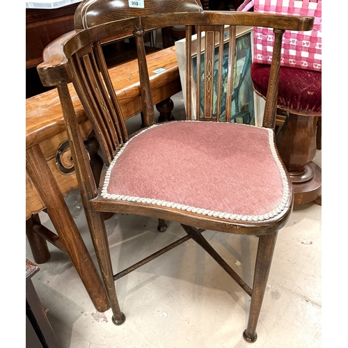 996 - An Edwardian mahogany inlaid corner armchair.