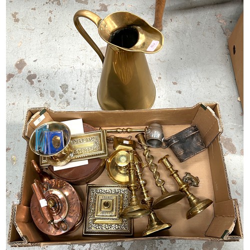 139 - A large brass jug; a copper kettle and decorative metalware.