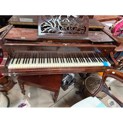 927 - An early 20th century baby grand piano by Gaveau, Paris, iron framed, overstrung, in rosewood case a... 