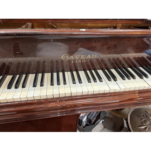 927 - An early 20th century baby grand piano by Gaveau, Paris, iron framed, overstrung, in rosewood case a... 