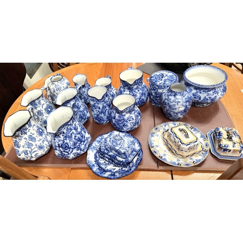 Losol Ware, a collection of blue and white Losol Ware graduating jugs etc.