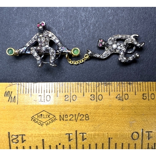 630 - A Victorian design novelty brooch of 2 monkeys, one seated, the other suspended on a chain, diamond ... 