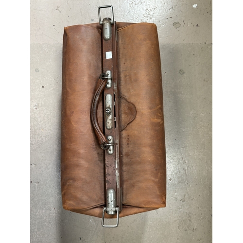 176 - A vintage Gladstone bag and two safe lock boxes.