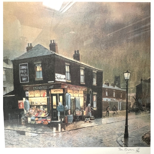 21 - Tom Brown: cobbled street with fairground and Entwistle's corner shop; a pair of artist signed limit... 
