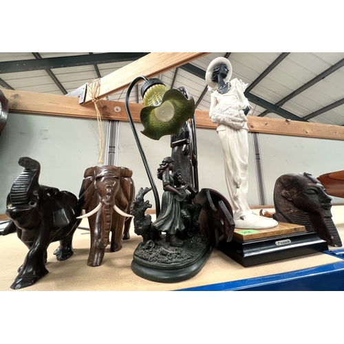 214 - A Florence resin figure of a woman, a bronze effect table lamp in the form of boy and girl, other ca... 