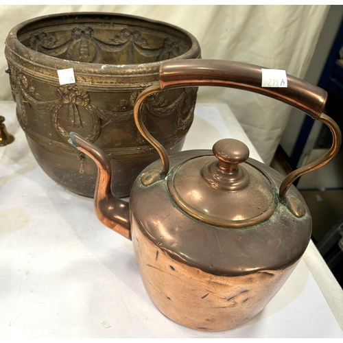 219A - Three copper planters; a copper kettle and a brass trivet.