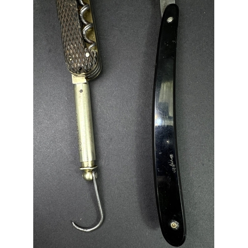 265 - A Lorb Patent Fisherman's pocket knife, including scales etc and a straight razor