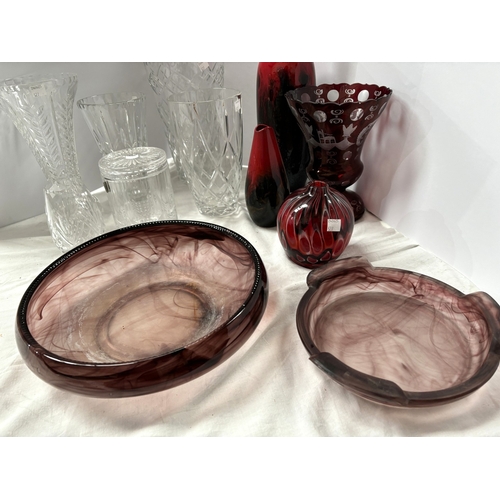 527 - An Art Deco mottled glass table centre, a collection of coloured and other glass vases; a Doulton Fl... 