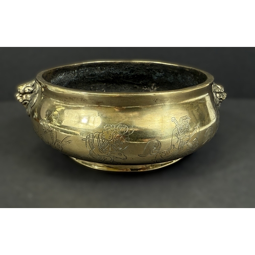 540A - A Chinese polished bronze censer with lion face mask handles, 6 character mark impressed to base, ov... 