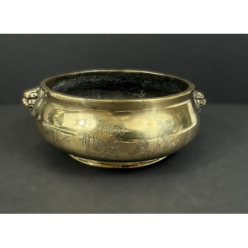 540A - A Chinese polished bronze censer with lion face mask handles, 6 character mark impressed to base, ov... 