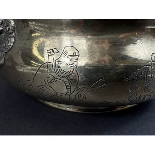 540A - A Chinese polished bronze censer with lion face mask handles, 6 character mark impressed to base, ov... 