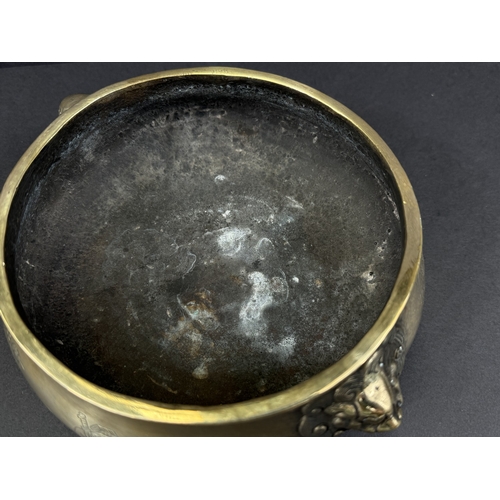 540A - A Chinese polished bronze censer with lion face mask handles, 6 character mark impressed to base, ov... 