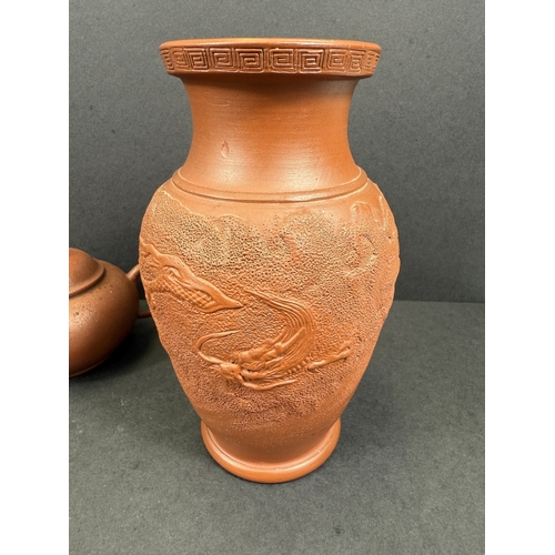 540E - Three Chinese traditional Yixing terracotta teapots; a similar Yixing terracotta baluster vase with ... 