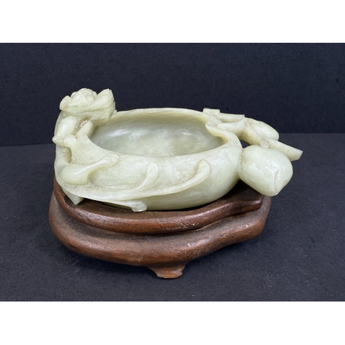 540J - A Chinese carved jade lotus flower brush wash pot with animal and fruiting branch detail, w. 12cm, 1... 