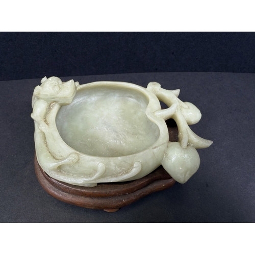 540J - A Chinese carved jade lotus flower brush wash pot with animal and fruiting branch detail, w. 12cm, 1... 