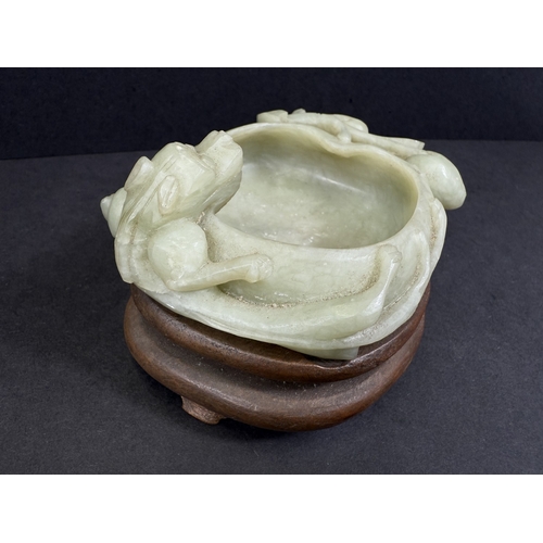 540J - A Chinese carved jade lotus flower brush wash pot with animal and fruiting branch detail, w. 12cm, 1... 