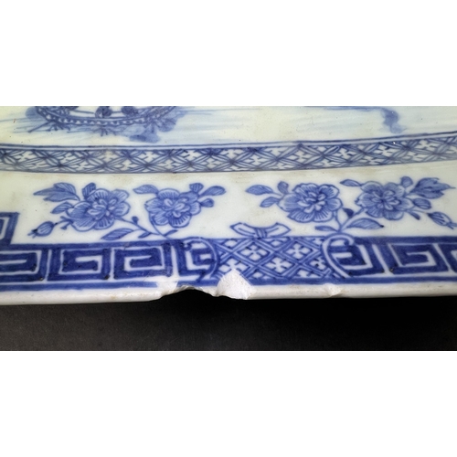 546 - A 19th century Chinese Nanking porcelain blue and white serving dish, 37cm (chips to right hand side... 