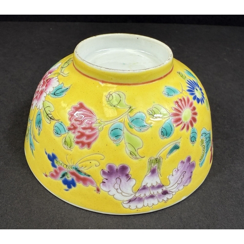 552 - A Chinese porcelain bowl, 19th century, naturalistic decoration on yellow ground, 11cm diameter