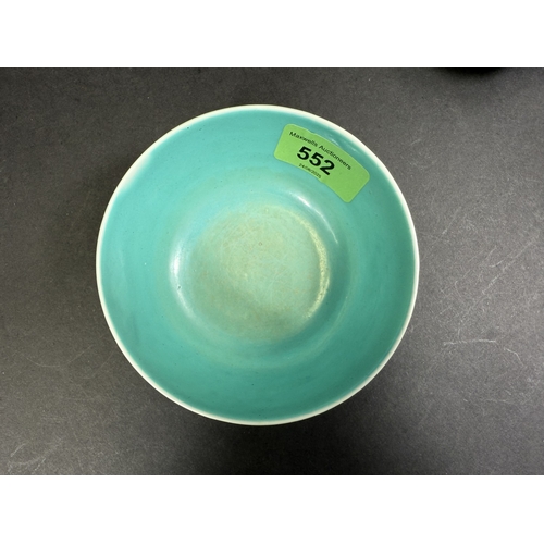 552 - A Chinese porcelain bowl, 19th century, naturalistic decoration on yellow ground, 11cm diameter