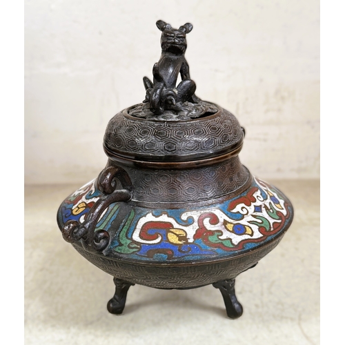 560 - A 19th century Chinese bronze incense burner of squat form carried on three legs, decorated in colou... 