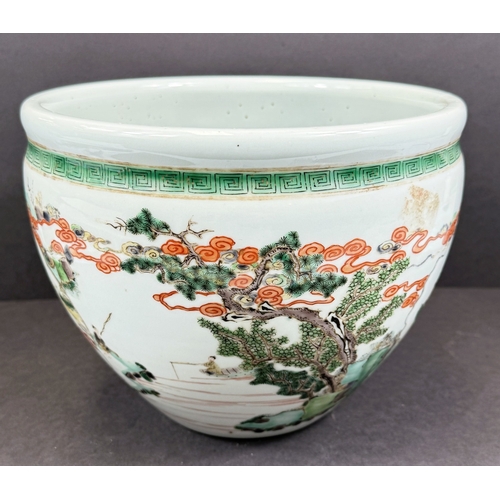 560A - A Chinese famille vert jardiniere with painted decoration of men fishing, trees, landscapes etc. dia... 